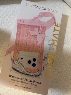 LoveShackFancy waterproof phone pouch
